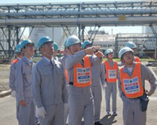 President Koshiba visiting a plant