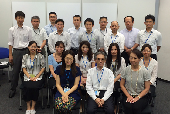 Team members gathered after the results briefing