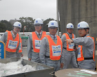 President Koshiba visiting a plant