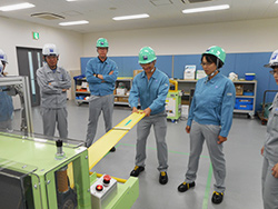 Hands-on safety training in an EHS meeting